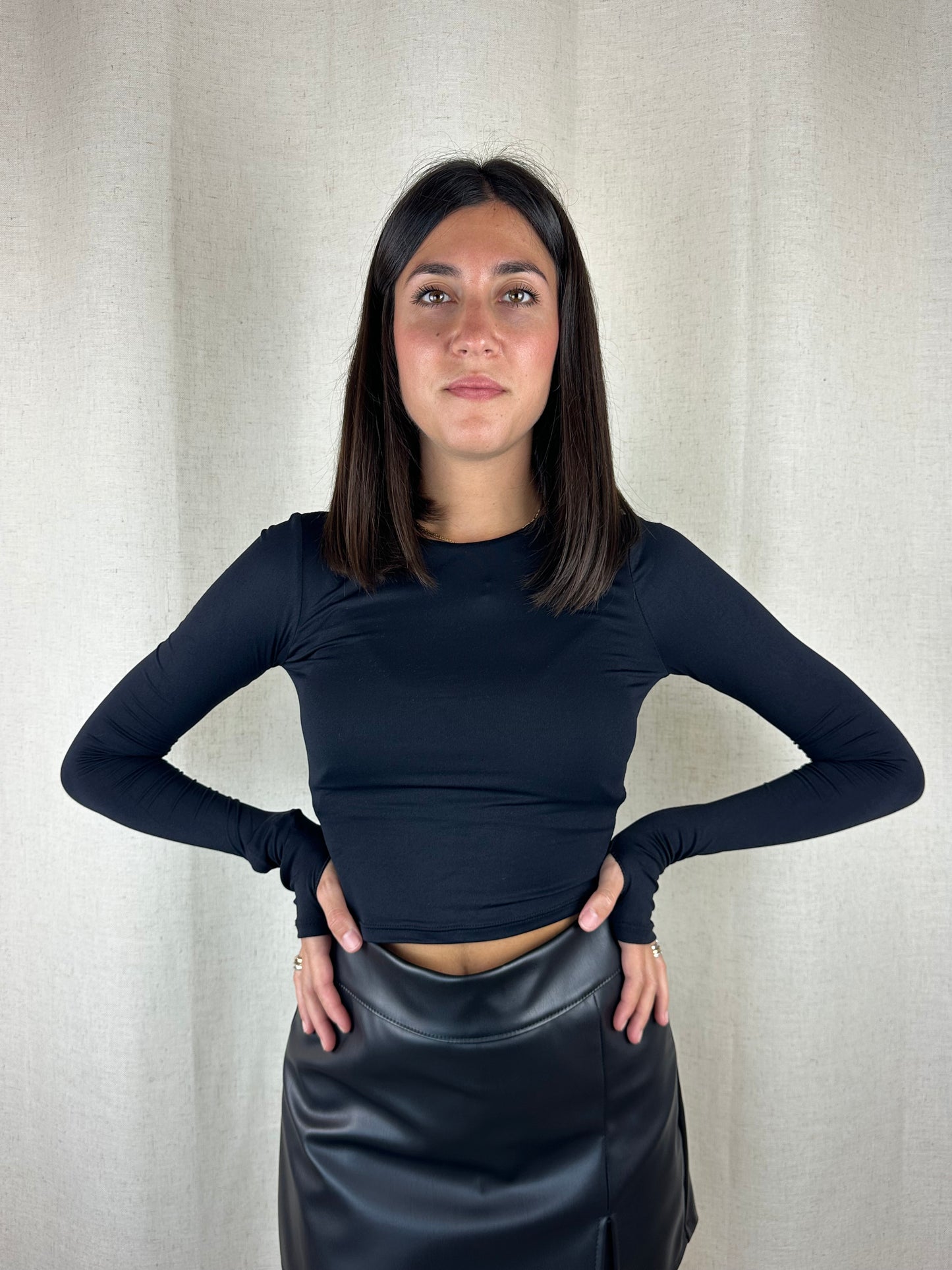 MAGLIA NERA POLSINO