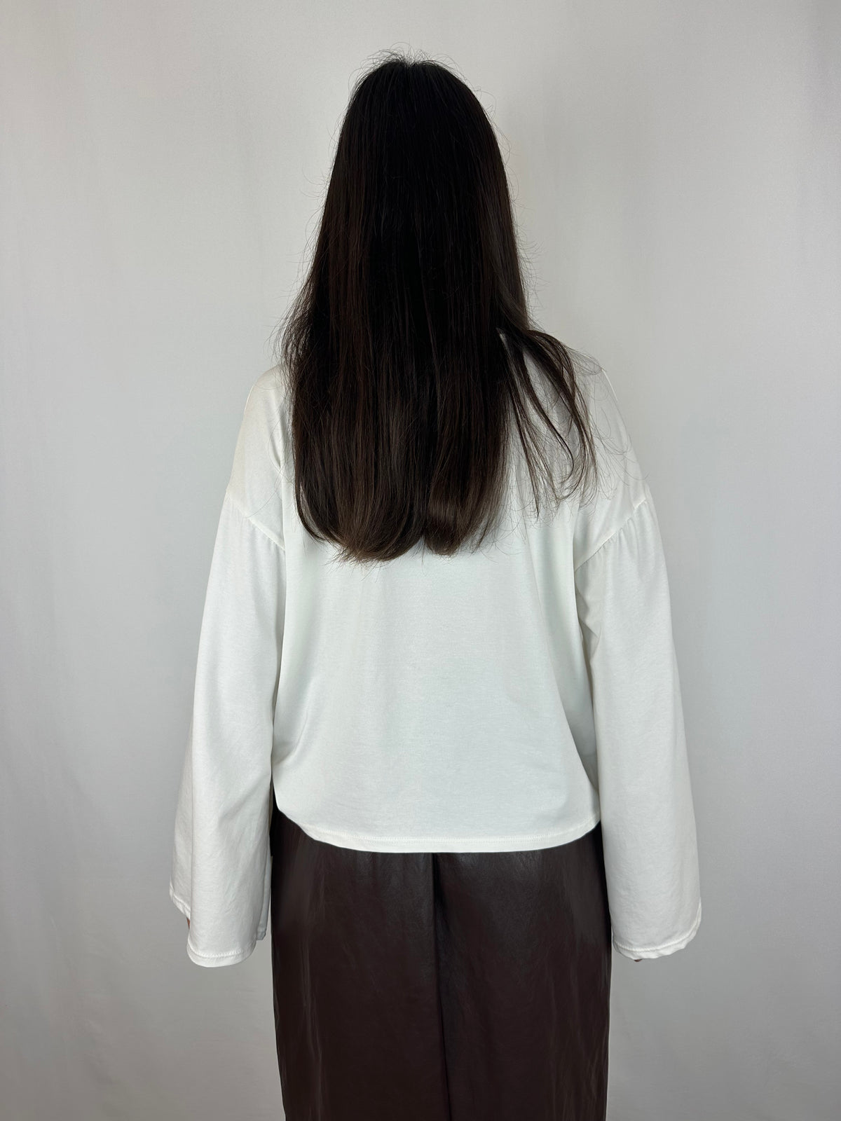 MAGLIA BIANCA MANICA SVASATA