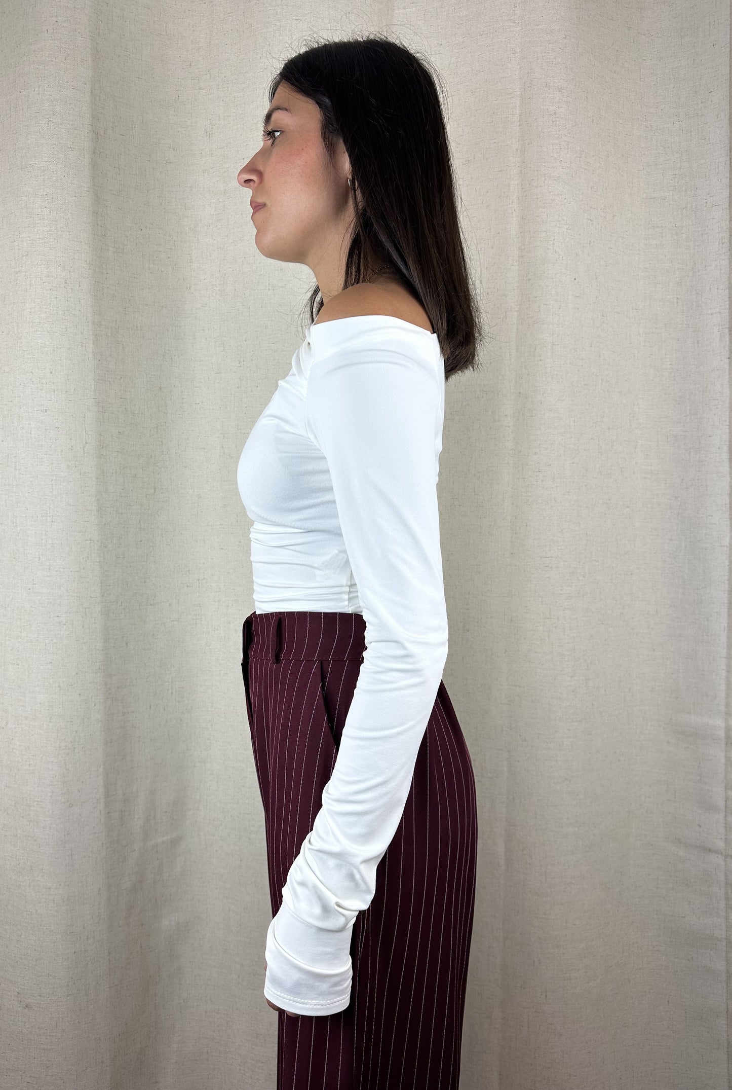 MAGLIA BIANCA ASIMMENTRICA POLSINI